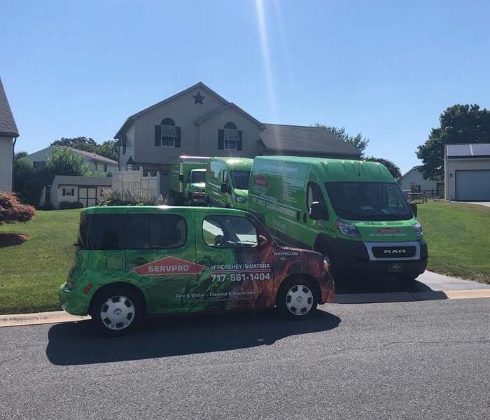 SERVPRO vehicle parked in front of a house
